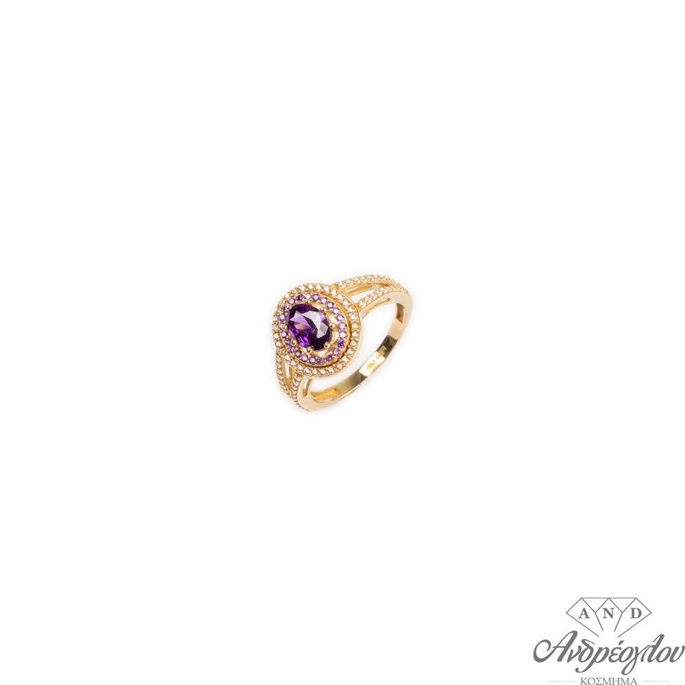 14ct Gold Ring.  It has small zircon stones in purple color
